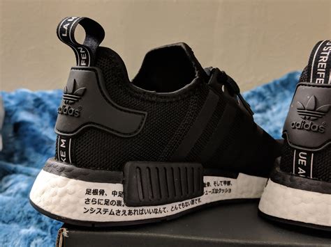 adidas nmd r1 japanese writing.